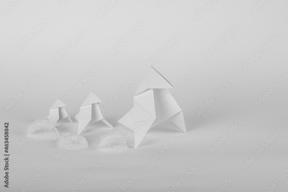 Origami of little birds and their feathers Origami of little birds and their feathers