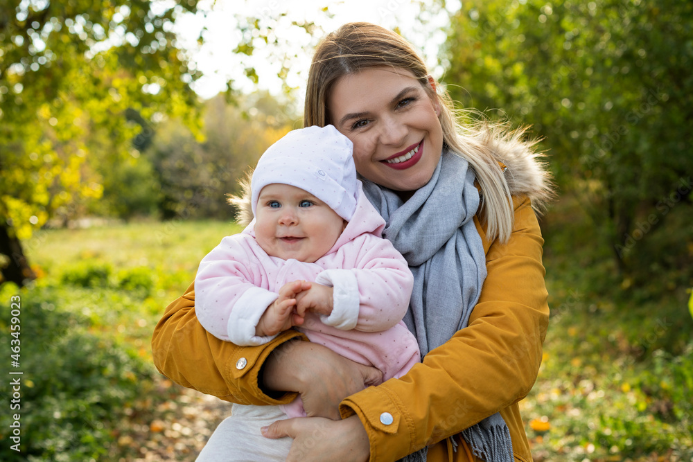 Happy beautiful mother spending time with her little baby girl in nature. Happy beautiful mother spending time with her little baby girl in nature.