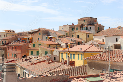 Elba, Italy – September 01, 2021: beautiful places from Elba Island. Aerial view to the island. Little famous villages near the beaches. Summer tourist places. Clouds and blue sky in the background.