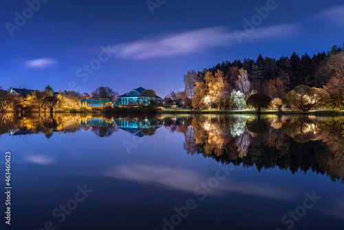 Moscow. October 15, 2021. Meshchersky Park and a pond in the moonlight. Autumn, night landscape with beautiful reflection