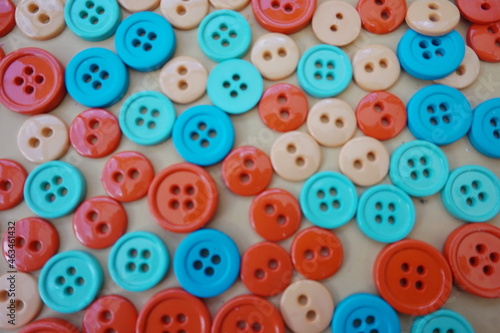 Medium Blue Light Blue Orange and Red Buttons Suitable as Background