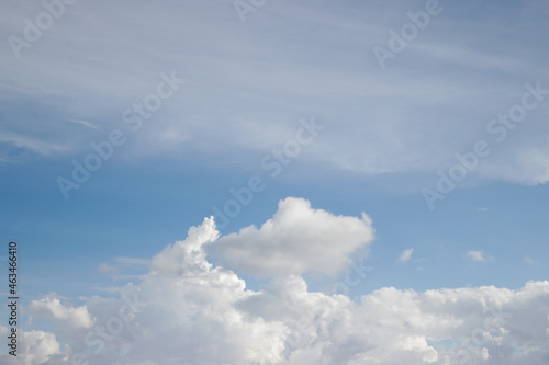 Cumulus clouds with a clear blue sky background in the midday. Types of clouds stock images.