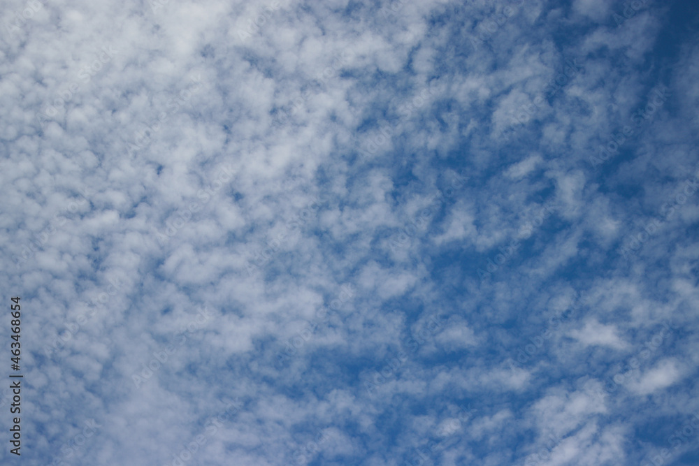 Cirrocumulus clouds with a clear blue sky background. Types of clouds stock images. Cirrocumulus clouds with a clear blue sky background. Types of clouds stock images.