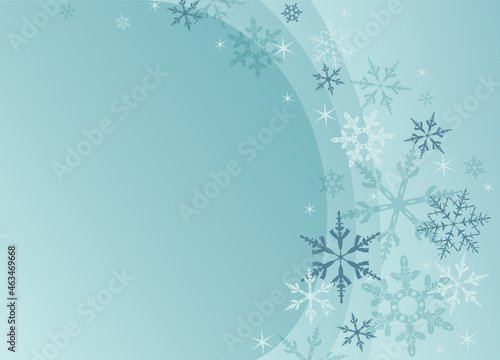 Snowflakes flying up around a curve with copyspace
