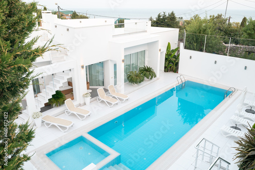 white villa with a swimming pool