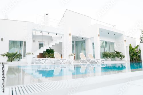 white villa with a pool