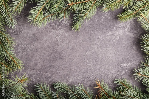 Christmas green border on a gray rock background