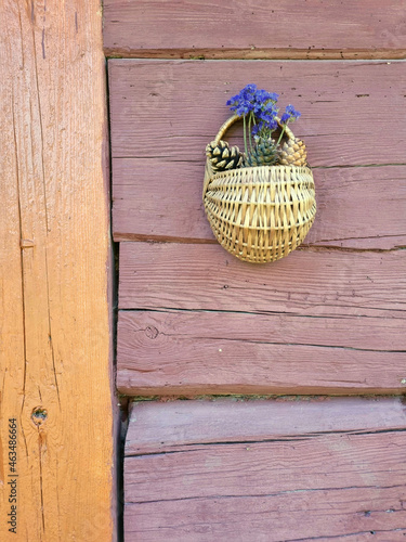 Wooden basket with flowers