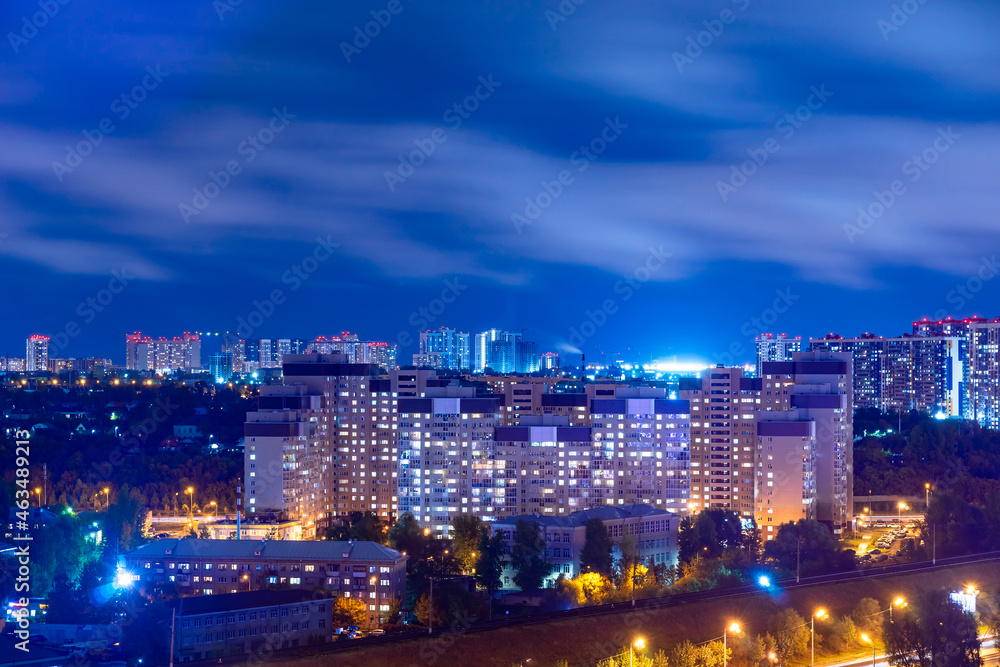 Residential neighborhoods of a Russian city. Residential areas with high-rise buildings. Kazan, top view. Night skyline 