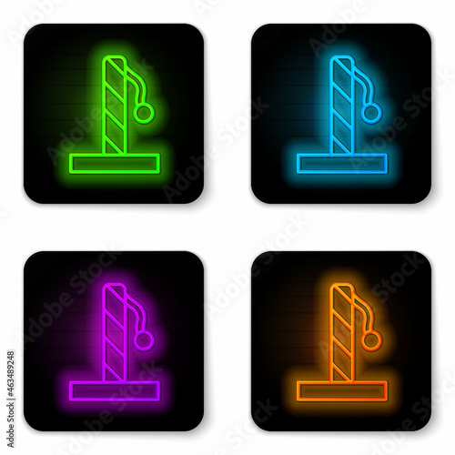 Glowing neon line Cat scratching post with toy icon isolated on white background. Black square button. Vector