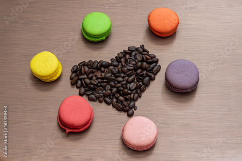 Valentain days still life with macaroons and coffee beans heart photo
