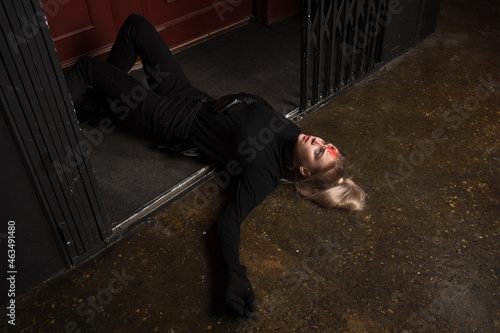 Hit woman. Woman in a black killed in gunfire shot in the head..