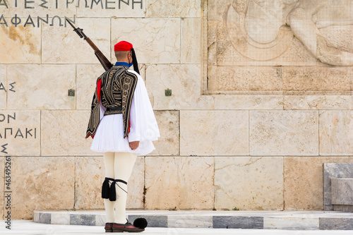 Soldier of the presidential guard standing in front of the monument of the Unknown Soldier in Athens, Greece. photo