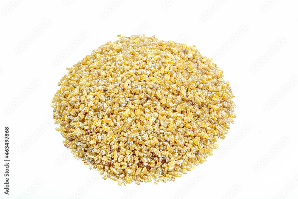 Pile of bulgur raw grain isolated at white background. Organic healthy vegetarian food. Pile of bulgur raw grain isolated at white background. Organic healthy vegetarian food.