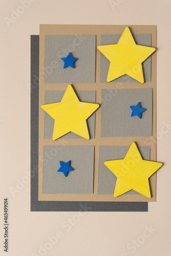 yellow and blue stars on paper squares