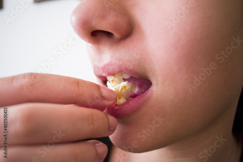 Wallpaper Mural Young girl eating homemade sweet popcorn Torontodigital.ca