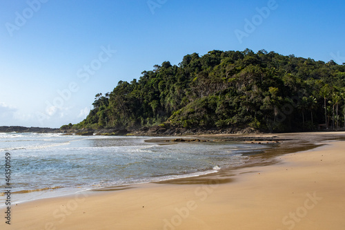 Engenhoca beach, in Itacaré, Bahia - Brazil. Beautiful landscape with rocks and coconut trees