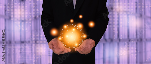 Business man holding abstract circle networks for data information on cloud computing network concept.