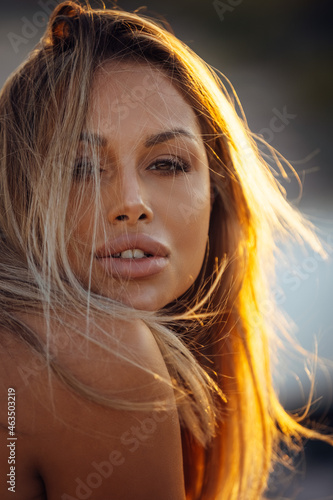 Summer outdoor style beach sea vacation portrait of beautiful girl in bikini. Summer vacation. Denmark.