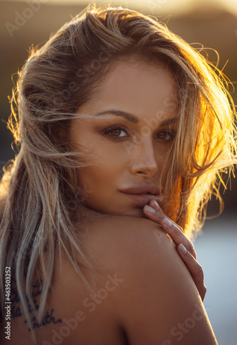 Summer outdoor style beach sea vacation portrait of beautiful girl in bikini. Summer vacation. Denmark.