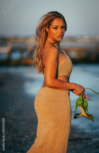 Summer outdoor style beach sea vacation portrait of beautiful girl in bikini. Summer vacation. Denmark.