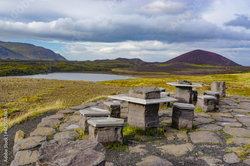 Snaefellsne Peninsula, Iceland: Artistic tables and seats made of metal and rock, overlooking Selvallavatn Lake.