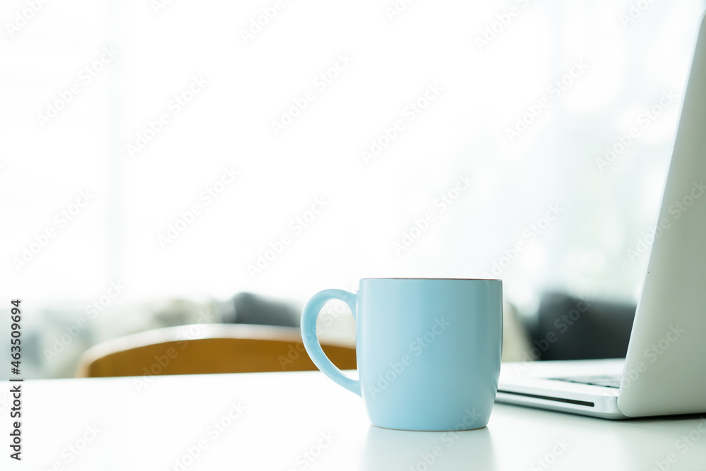 Hot black coffee in the blue coffee mug on the table. Hot black coffee in the blue coffee mug on the table.