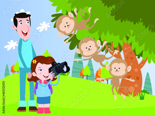 Little girl using a camera to taking photo of monkey at the zoo while enjoying leisure time with her father