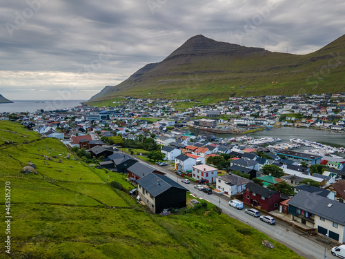 Beautiful aerial view of the City of Klaksvik in the Fareo Islands with its colorful houses and amazing canal and view to the majestic Kunoy Park