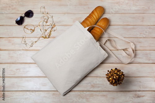 Tote bag mockup with french baguette and sunglasses