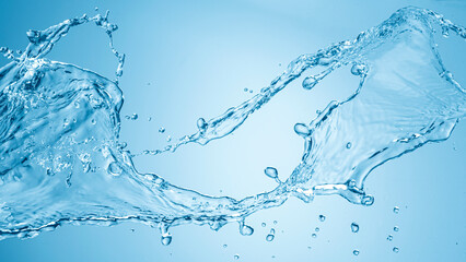 Water splash isolated on blue background