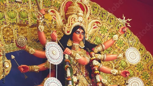 Closed shot of beautifully decorated Durga idol during Durga Puja festival in West Bengal, India. photo