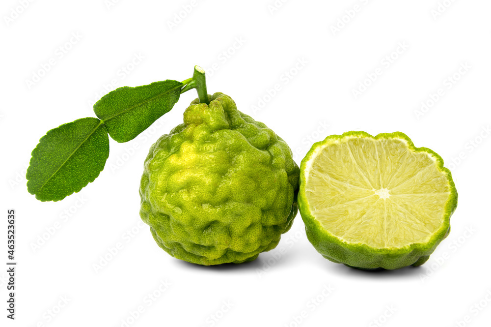 bergamot and halved fresh kaffir lime isolated on white background bergamot and halved fresh kaffir lime isolated on white background