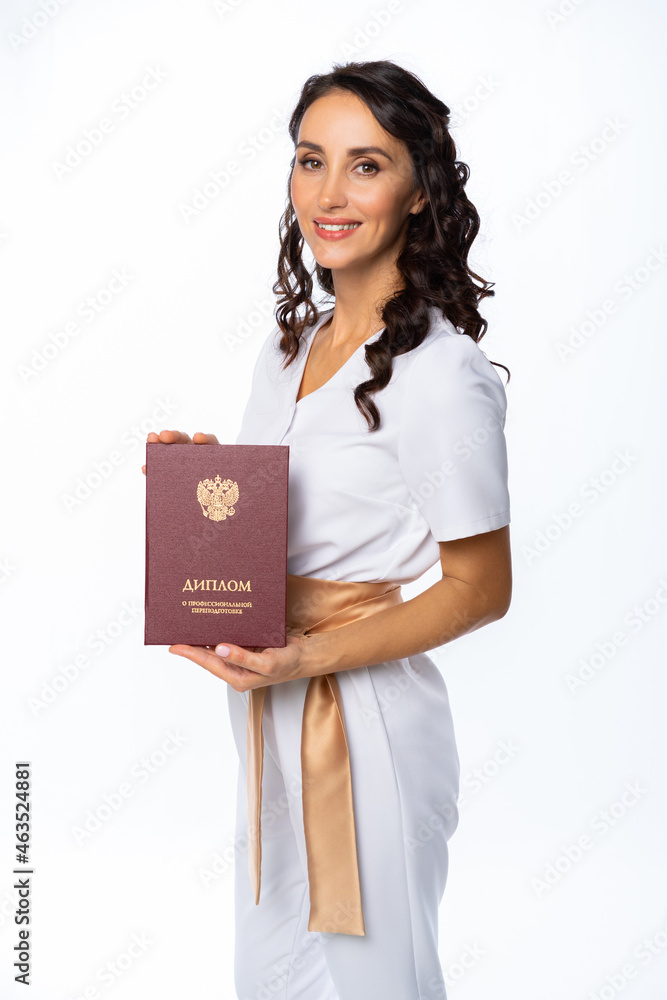 a specialist woman received a diploma, completed courses, won a cup in a competition. certified specialist. isolated white background a specialist woman received a diploma, completed courses, won a cup in a competition. certified specialist. isolated white background