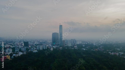 Wallpaper Mural Hyperlapse at a foggy morning, above small forest in middle of Mexico City Torontodigital.ca