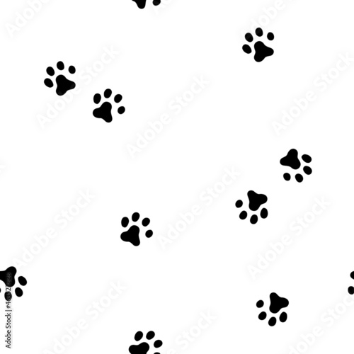 vector seamless pattern with cute dog footprints
