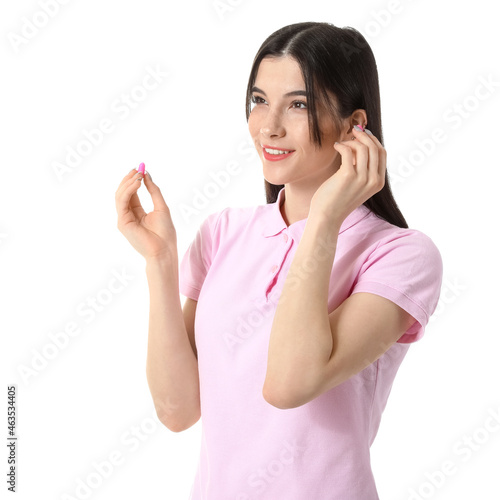 Pretty young woman with pin...