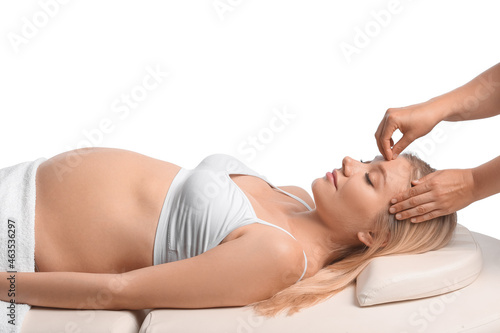 Young pregnant woman having...
