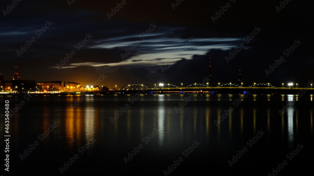 Autumn sunrise in Riga reflection of night lights in the Daugava Autumn sunrise in Riga reflection of night lights in the Daugava