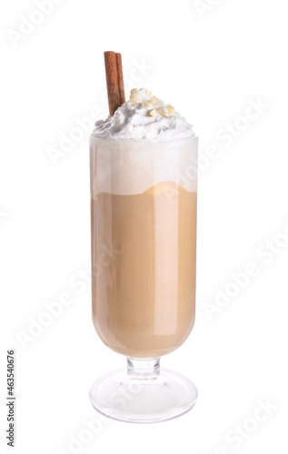 Glass of tasty latte with nuts on white background