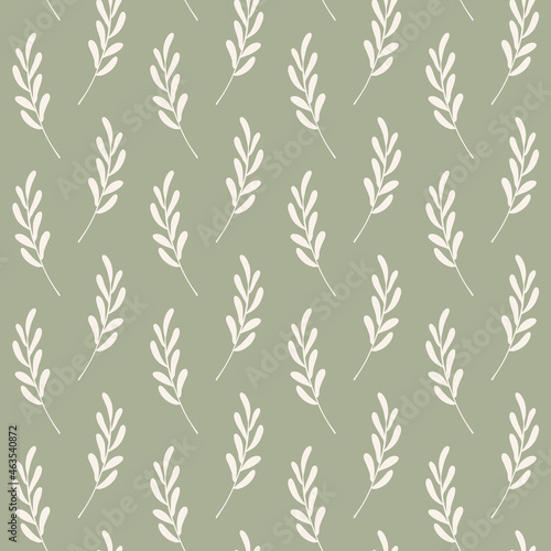 warm foliage seamless pattern of earth tone autumn leaves with sage green background