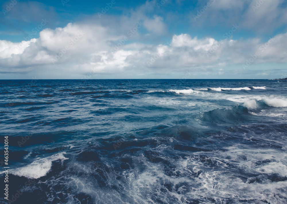 Blue sea with waves and clear blue sky