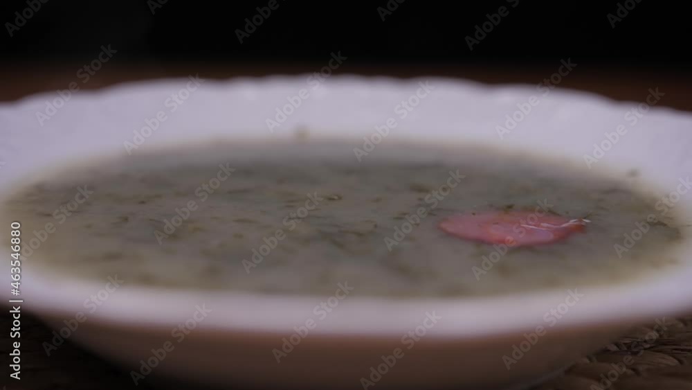 eating green broth caldo verde popular portuguese soup with spoon slow motion eating green broth caldo verde popular portuguese soup with spoon slow motion