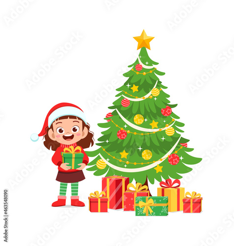 happy little girl holding present for christmas
