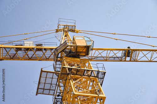 Wallpaper Mural Tower crane at the construction site, against the blue sky Torontodigital.ca