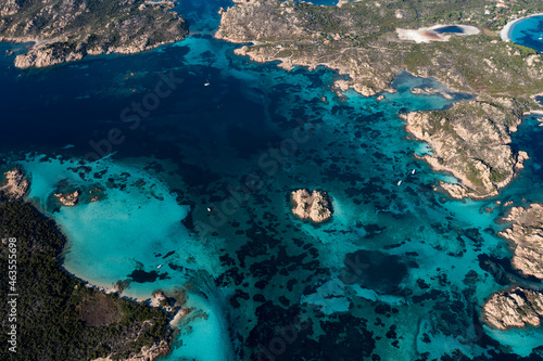 View from above, stunning aerial view of La Maddalena archipelago with Budelli, Razzoli and Santa Maia islands bathed by a turquoise and clear waters. Sardinia, Italy.