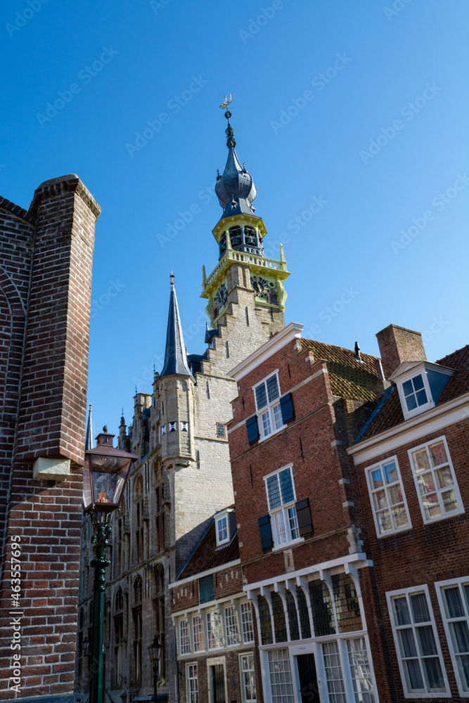 Obraz premium City view on old medieval houses in small historical town Veere in Netherlands, province Zeeland