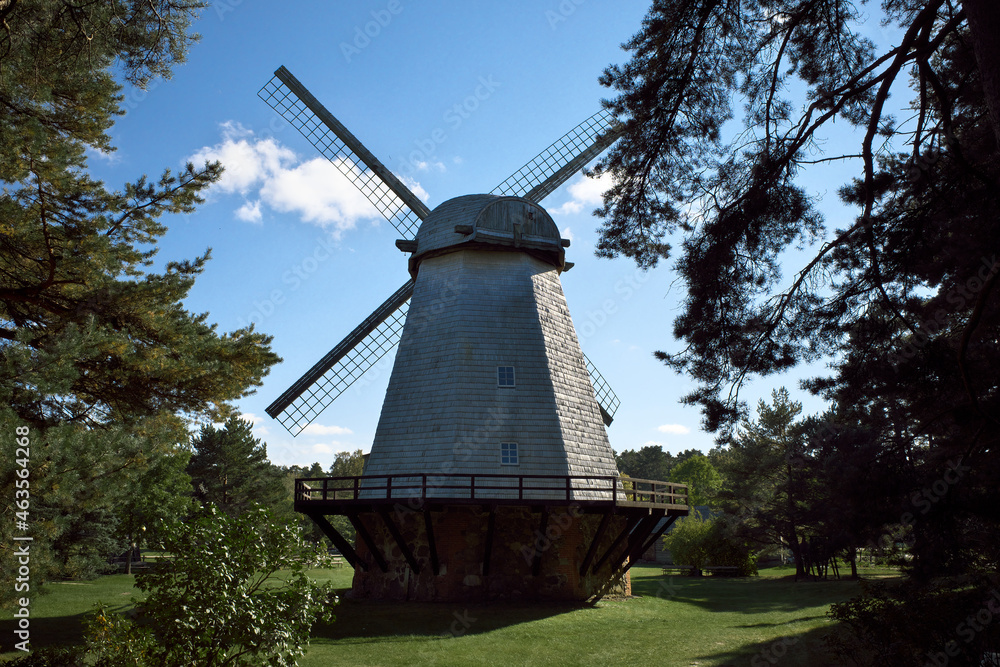 Flour mill Windmill in German style. Sunny summer weather.