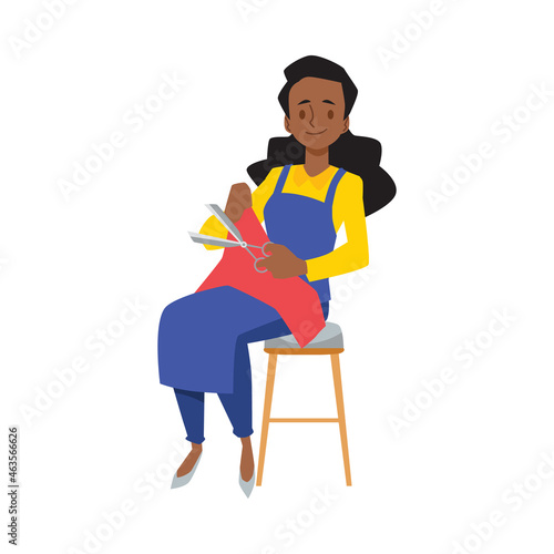 Indian woman sitting cutting fabric with scissors. Dark skinned female sewing fabric, seamstress cartoon character