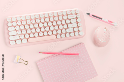 flat lay pink book stationery and keyboard